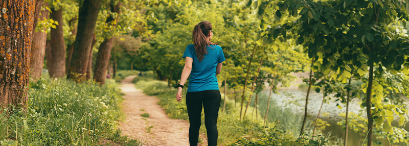 Woman walking outside in nature